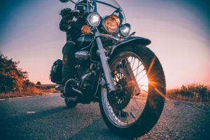 May is Motorcycle awareness month. Image of a motorcycle at sunset